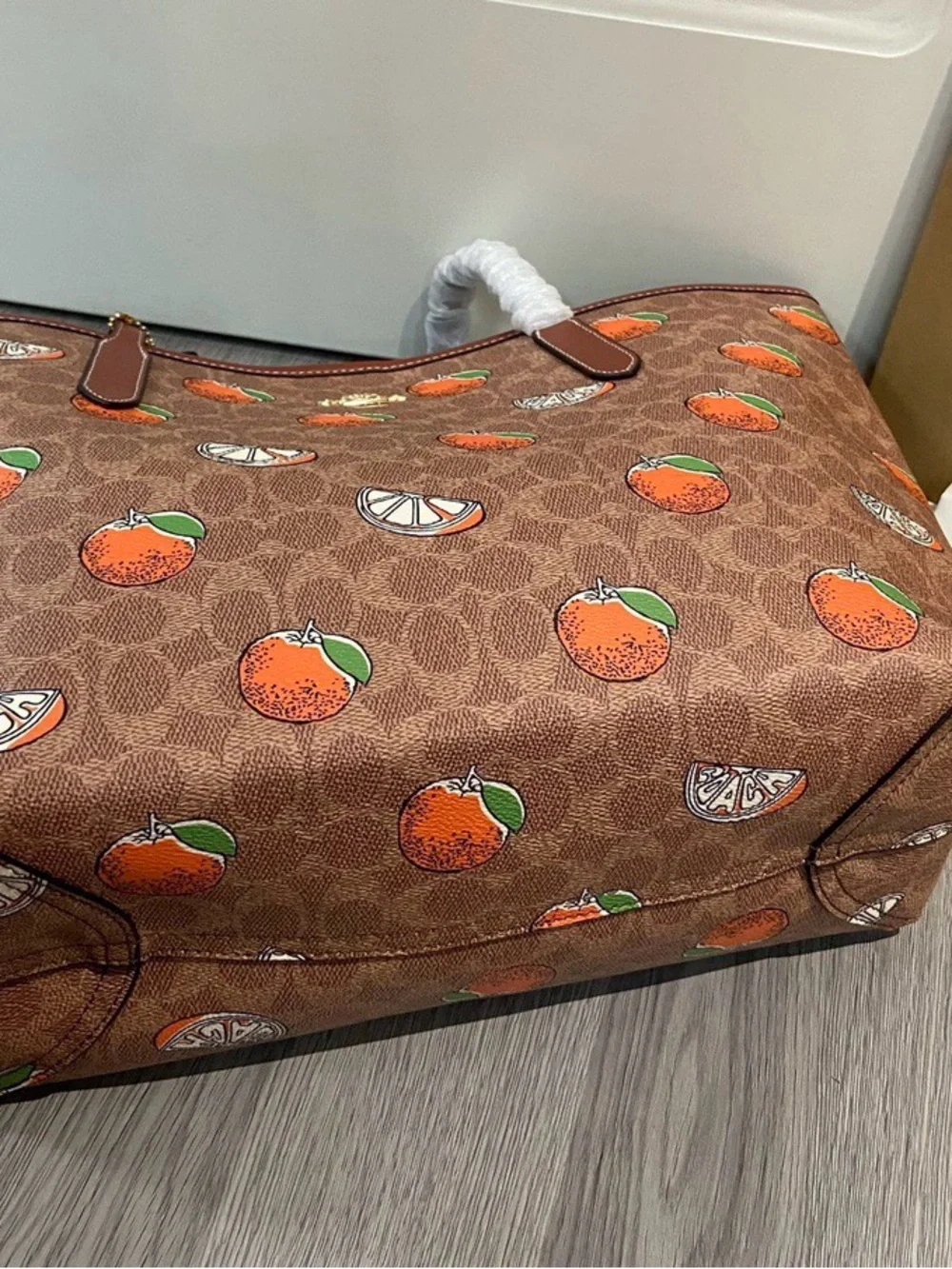 Coach Brown Canvas Tote with Orange Fruit Print